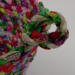 This is a close up of the knot to show the rustic look of raw edges and some runaway threads. This is a close up of the knot to show the rustic look of raw edges and some runaway threads.